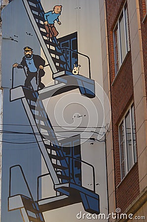 Tintin Comic Mural, Tintin, the boy reporter, his beloved fox terrier Snowy, and Captain Haddock, Rue de lâ€™Etuve Editorial Stock Photo